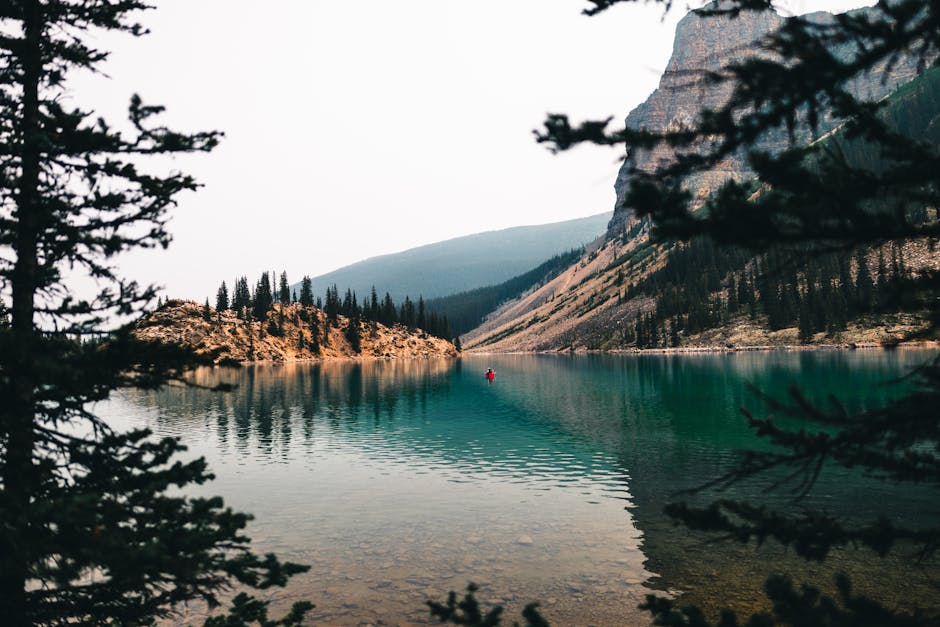 Idyllic view of a tranquil lake surrounded by mountains in Alberta, Canada