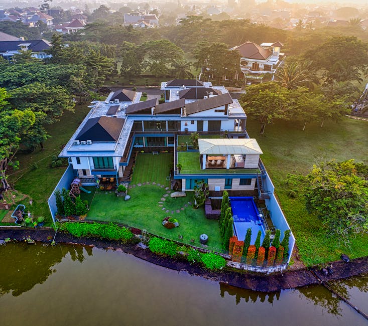 Stunning aerial view of a luxury villa by the river in Tangerang, Indonesia